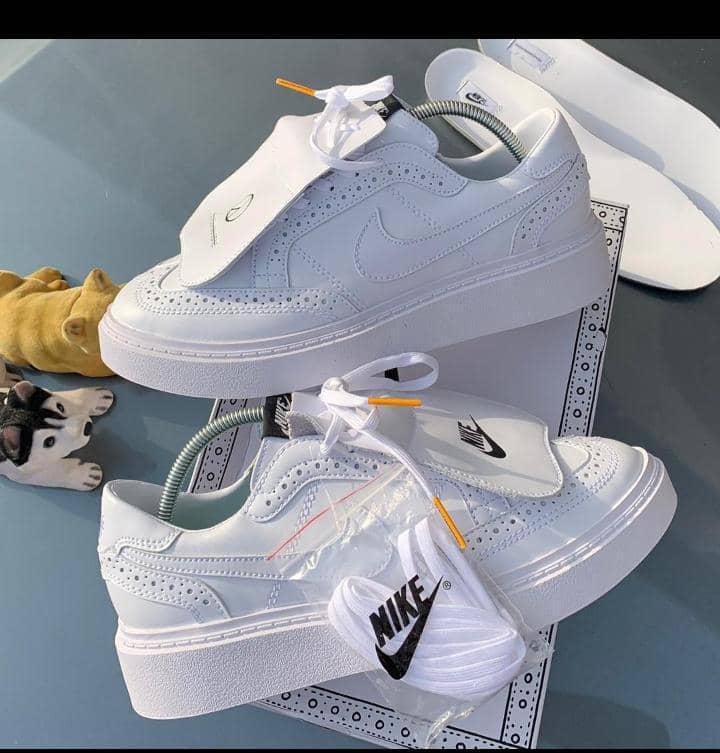Buy DESIGNER WHITE CANVASS SHOES by Unique Pearl Stores on Selar