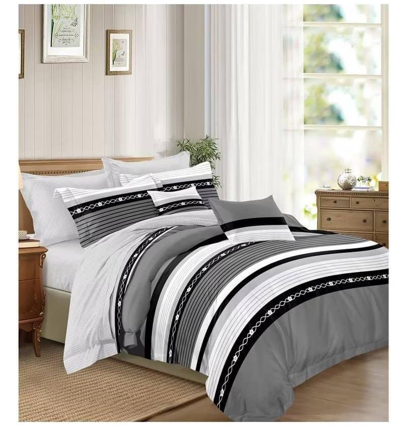 Duvet set (1 bedsheet, 4 pillowcases and a heavy reversible duvet)