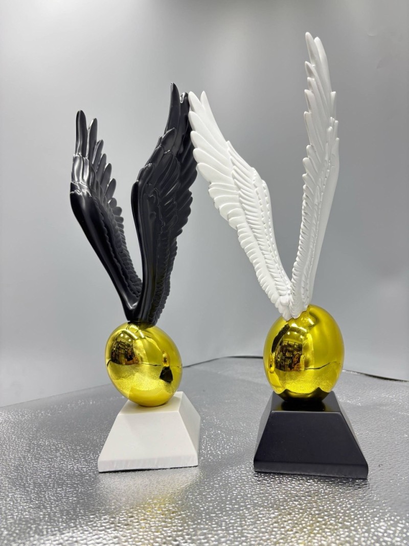 1 Luxury Wings Egg decor Gold, White and Black base neatly packaged.